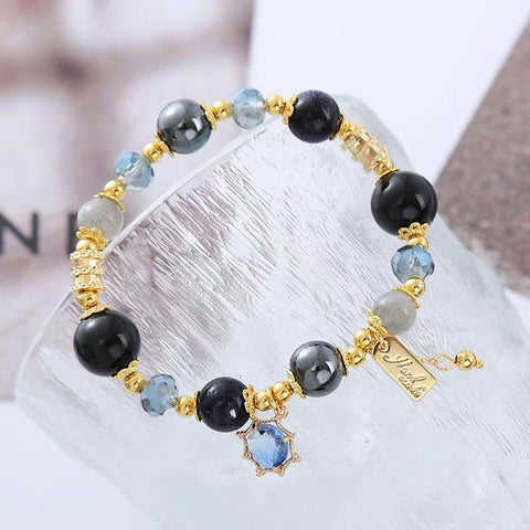Obsidian Crystal Hand Chain for Ladies - Sparkling Black Gallstone and Dazzling Blue Sandstone Galaxy - inspired Jewelry