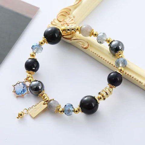 Obsidian Crystal Hand Chain for Ladies - Sparkling Black Gallstone and Dazzling Blue Sandstone Galaxy - inspired Jewelry